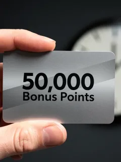 Credit card displaying 50,000 bonus points with a clock, highlighting a limited-time offer.