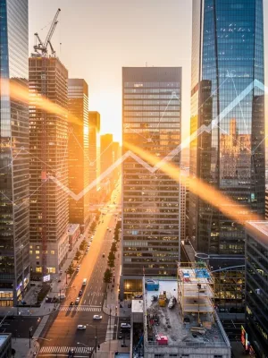 Modern city skyline at dawn, representing high-yield real estate investments in 2026