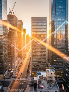 Modern city skyline at dawn, representing high-yield real estate investments in 2026